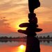 Stone balance art in the sunset by tamas kanya
