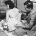 Tattooing japanese womans back c.1950