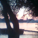 magasvíz a Dunán, naplementekor