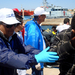 Lampedusa-NIHMP-operators-receives-landing-migrants