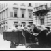 Man lying down on wagon seat, two women in back of wagon, Hungar