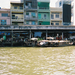 Unloading Products for local market Mekong Delta Vietnam 971345-