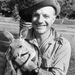 A head and shoulders portrait of a smiling Australian soldier as
