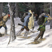 native-american-trappers-carrying-furs-on-snowshoes-in-a-forest-