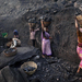 people-are-seen-carrying-baskets-of-illegally-scavenged-coal-fro