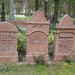 Négy felújított régi sírkő